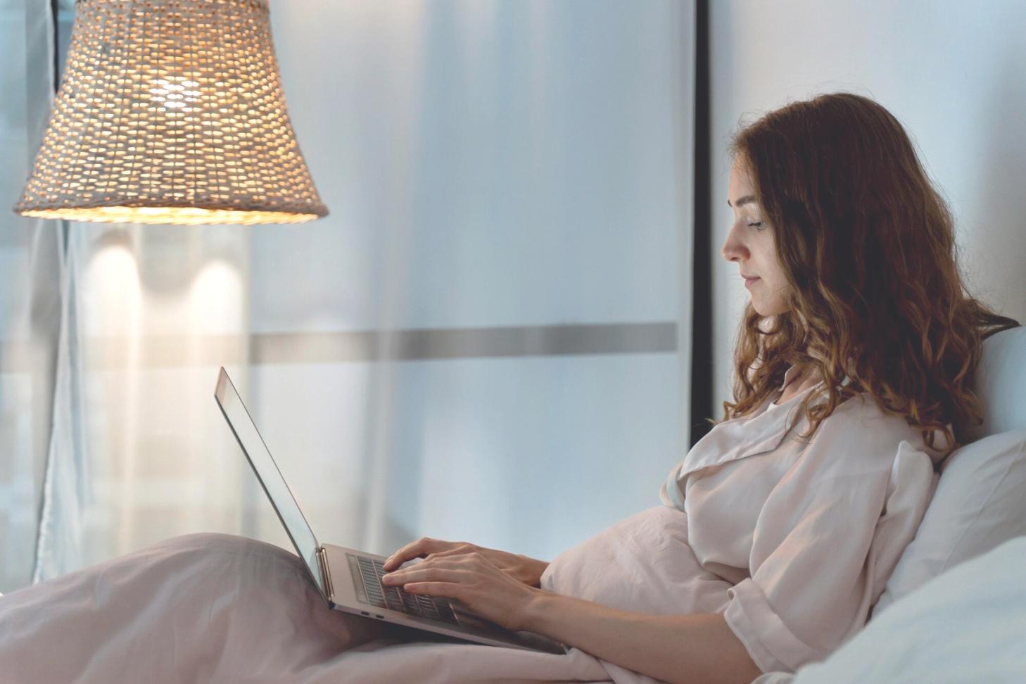 Financial analysis workspace with documents and laptop showing working capital metrics
